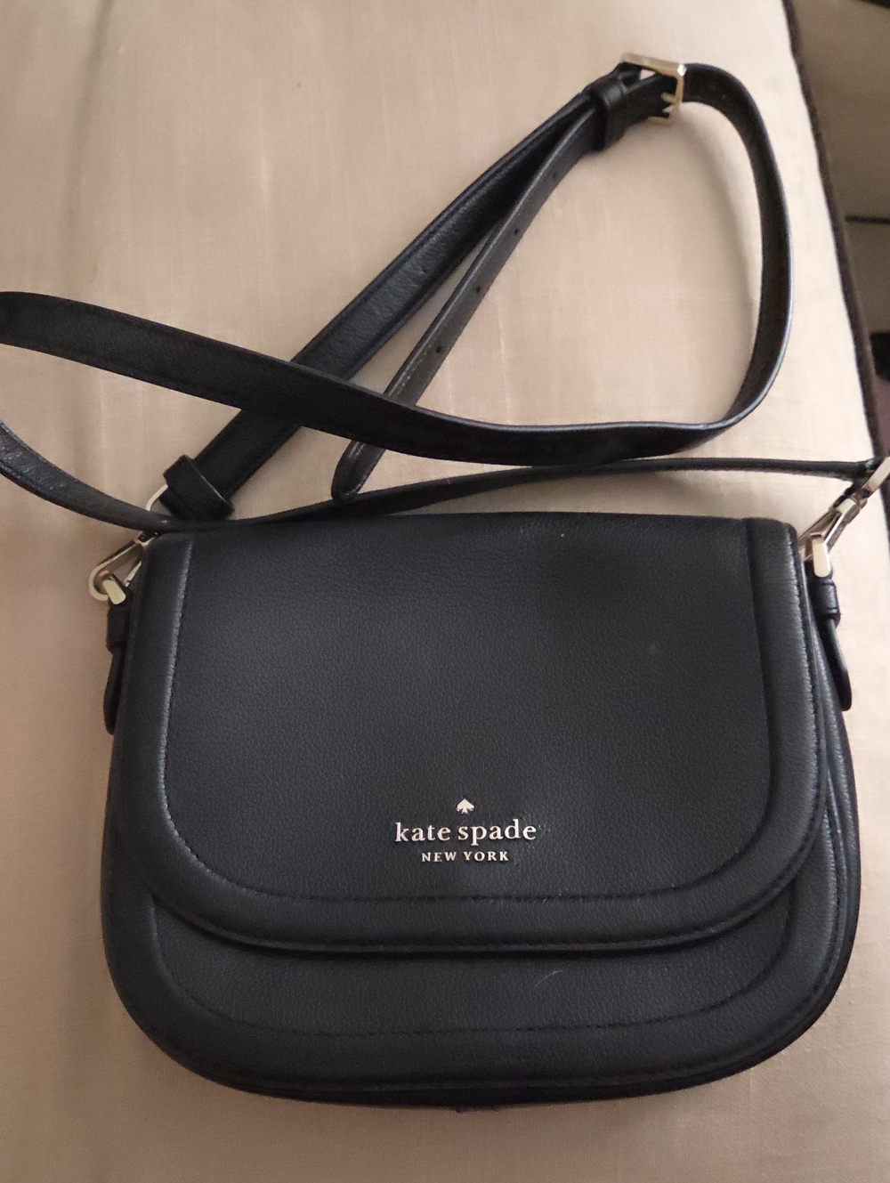 kate spade black leather pebbled crossbody with gold-tone logo